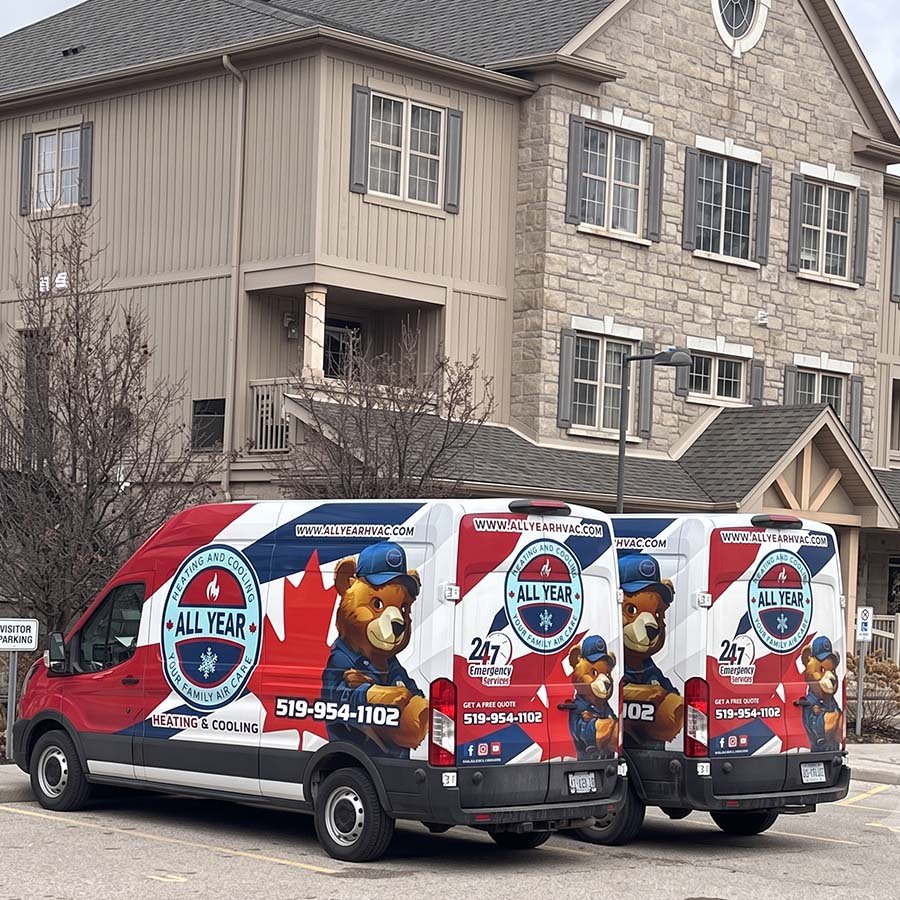 All Year Heating & Cooling service van parked in a residential driveway in Kitchener.